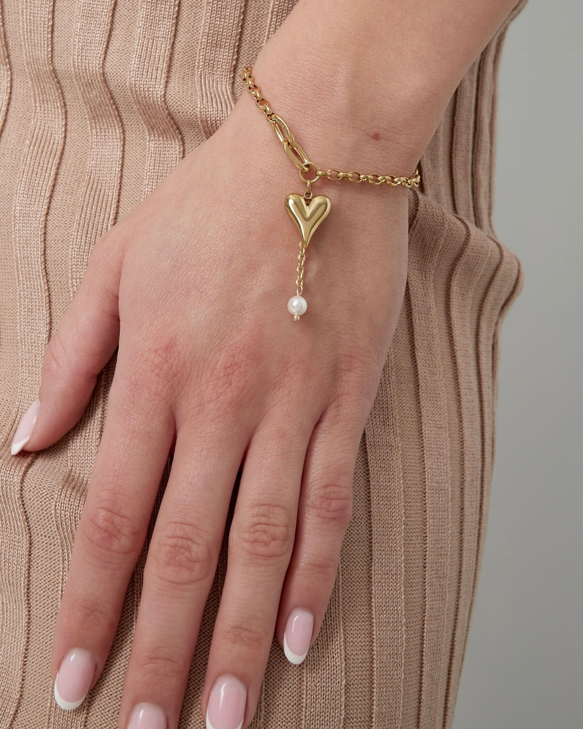Armband schöne Herzen - Gold